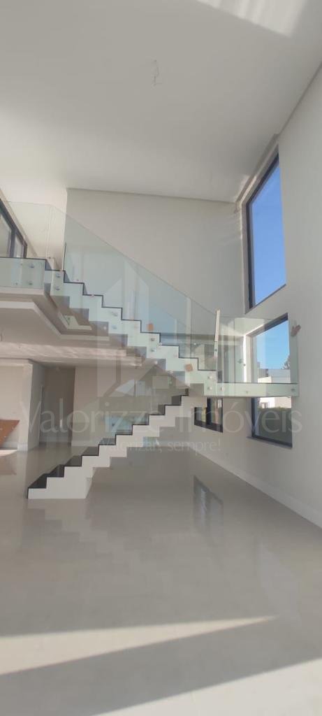 Casa em Condominio 5 dormitorios