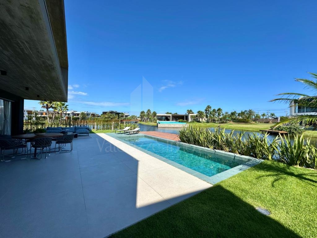 Casa em Condominio 5 dormitorios