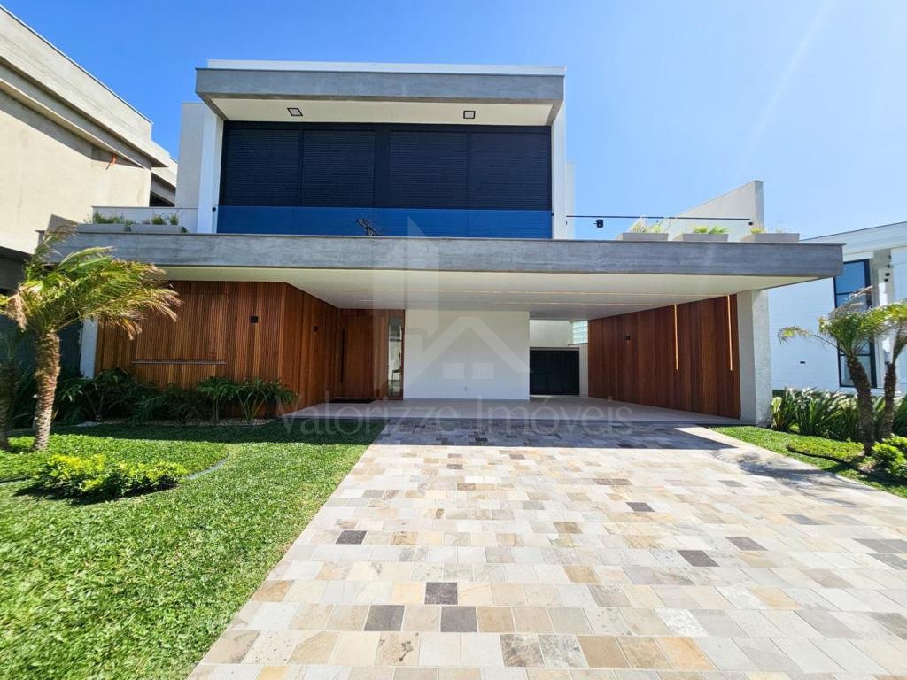 Casa em Condominio 5 dormitorios